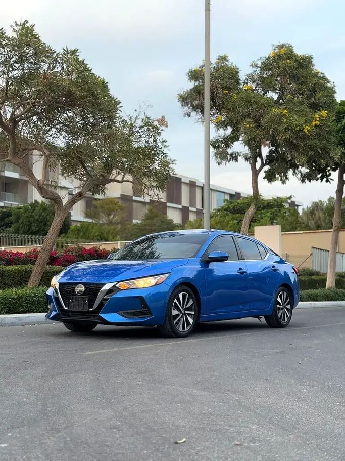 Подержанный Nissan Sentra VIII (B18), 2.0 л, 2023 в Аджмане от WB FINE CARS Синий цвет. Американская | AUTO.AE