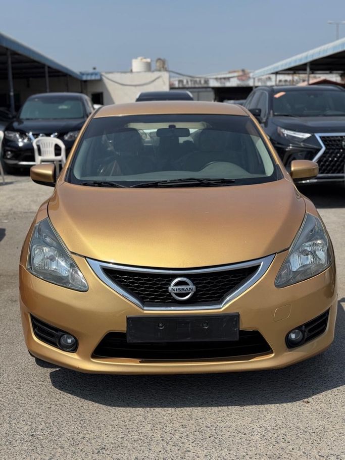 مستعملة ⁦Nissan Tiida أنا فيس ليفت، 1.6 l، 2014⁩ في في الإمارات, عجمان من KARIM CARS، اللون ذهبي. مواصفات الخليج | AUTO.AE | إعلان #288691