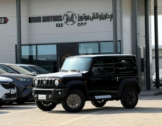 New Suzuki Jimny IV, 1.5 l, 2025 in Ajman by MWH MOTORS FZE, Black color. Japanese Specs | AUTO.AE