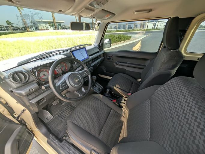 Подержанный Suzuki Jimny IV, 1.5 л, 2024 в ОАЭ, Аджман от SR MOTORS Желтый цвет. GCC | AUTO.AE | Объявление #295766 — фото 11 из 18