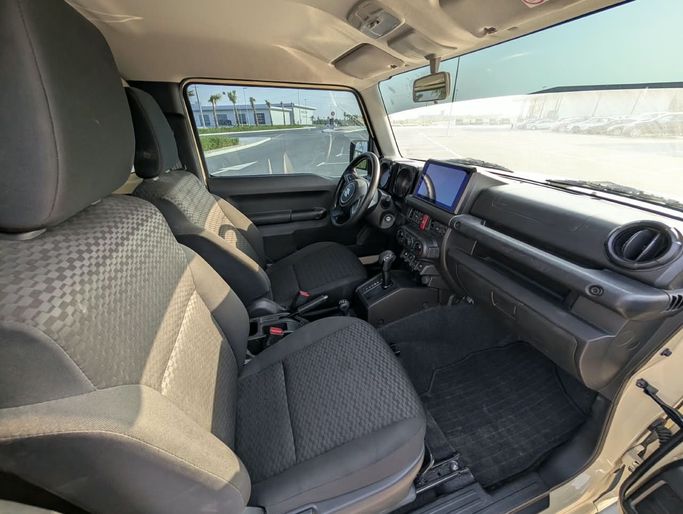 Подержанный Suzuki Jimny IV, 1.5 л, 2024 в ОАЭ, Аджман от SR MOTORS Желтый цвет. GCC | AUTO.AE | Объявление #295766 — фото 13 из 18