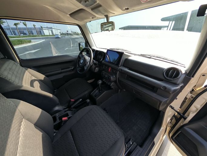 Подержанный Suzuki Jimny IV, 1.5 л, 2024 в ОАЭ, Аджман от SR MOTORS Желтый цвет. GCC | AUTO.AE | Объявление #295766 — фото 14 из 18