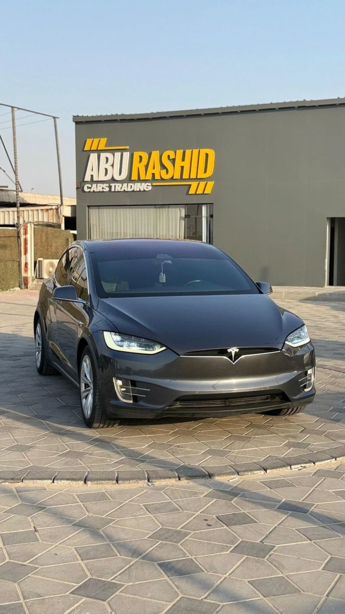 Подержанный Tesla Model X 75D I, 2018 в Аджмане от Abu Rashid Cars  Черный цвет. GCC | AUTO.AE