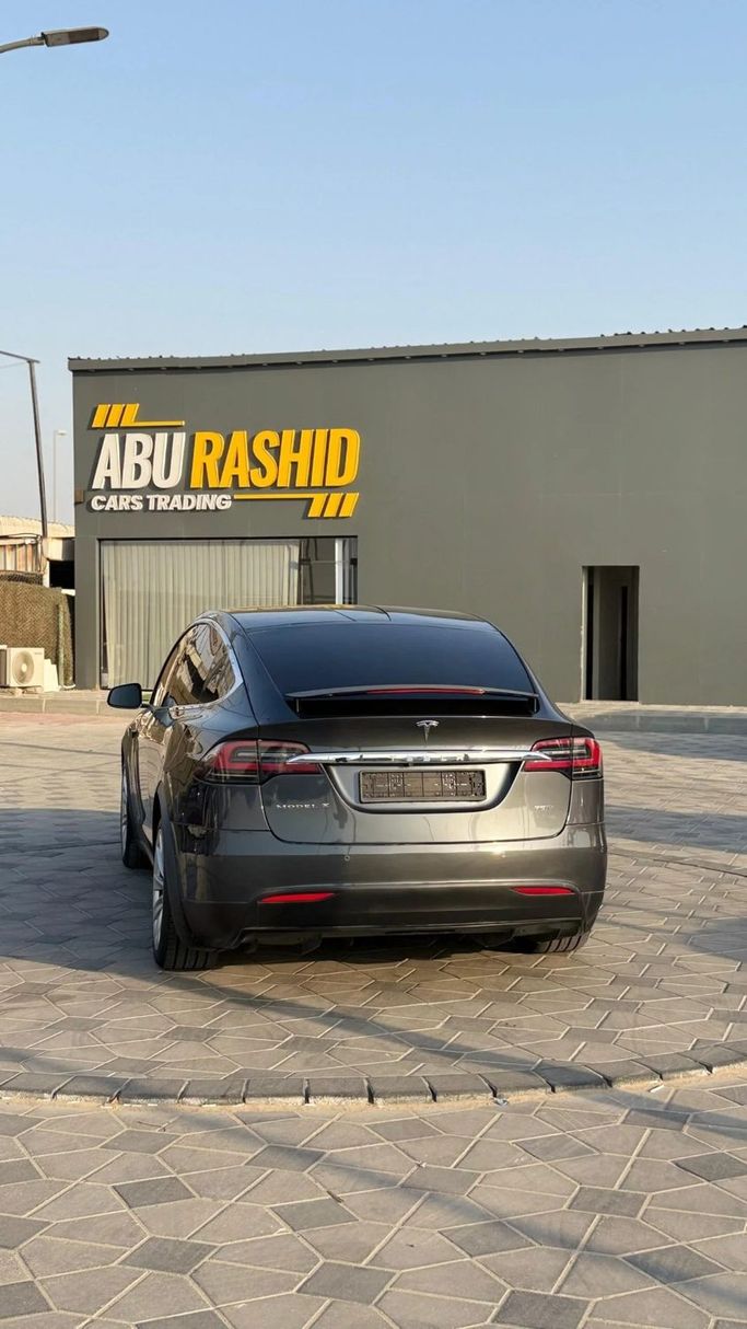 Подержанный Tesla Model X 75D I, 2018 в Аджмане от Abu Rashid Cars  Черный цвет. GCC | AUTO.AE