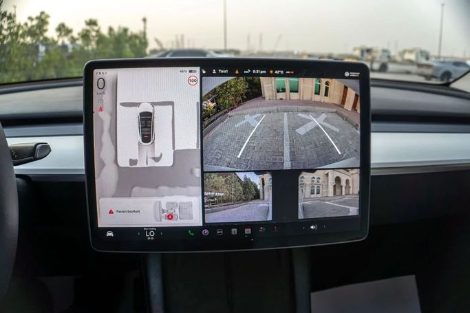 Подержанный Tesla Model Y Long Range I, 2023 в Аджмане от AMG Cars Белый цвет. GCC | AUTO.AE