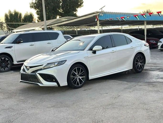 Подержанный Toyota Camry VIII (XV70), 3.5 л, 2021 в Аджмане от SHEIKH MORAD USED CARS Белый цвет. GCC | AUTO.AE