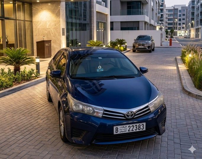 Toyota Corolla XI (E160, E170, E180), 2015 седан  класса в Аджмане от Eagle Rent A Car синий цвет | AUTO.AE | Объявление #1534
