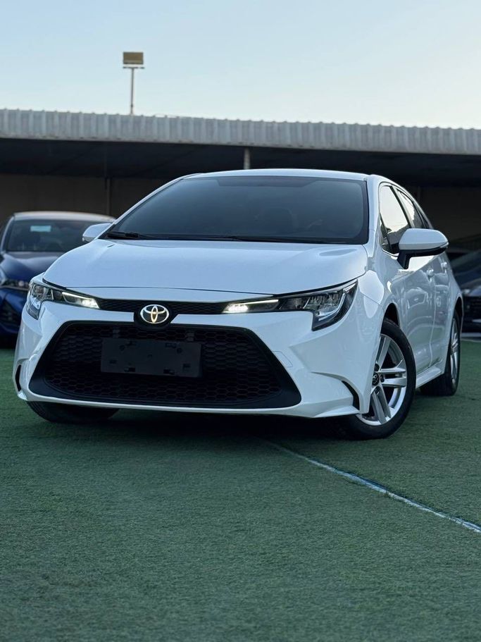 Подержанный Toyota Corolla Axio XI (E160, E170) Рестайлинг 2, 1.5 л, 2021 в Аджмане от Syria Motors Белый цвет. Японская | AUTO.AE