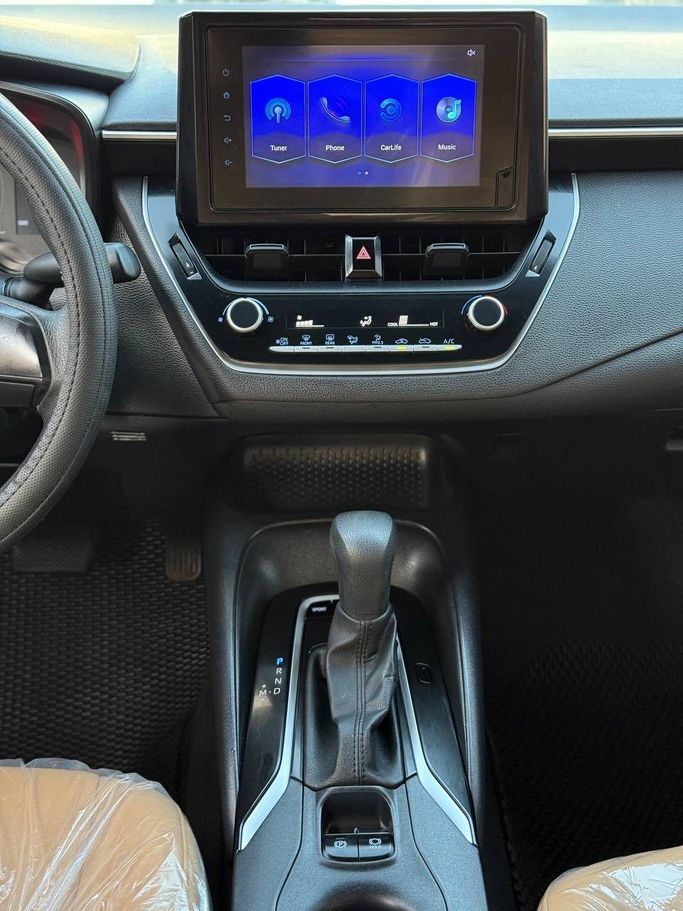 Подержанный Toyota Corolla Axio XI (E160, E170) Рестайлинг 2, 1.5 л, 2021 в Аджмане от Syria Motors Белый цвет. Японская | AUTO.AE