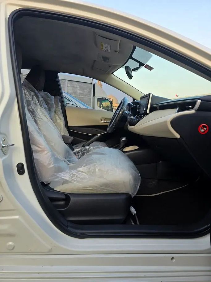 Подержанный Toyota Corolla XII (E210), 1.6 л, 2020 в Аджмане от Al Hilal Motors Белый цвет. GCC | AUTO.AE