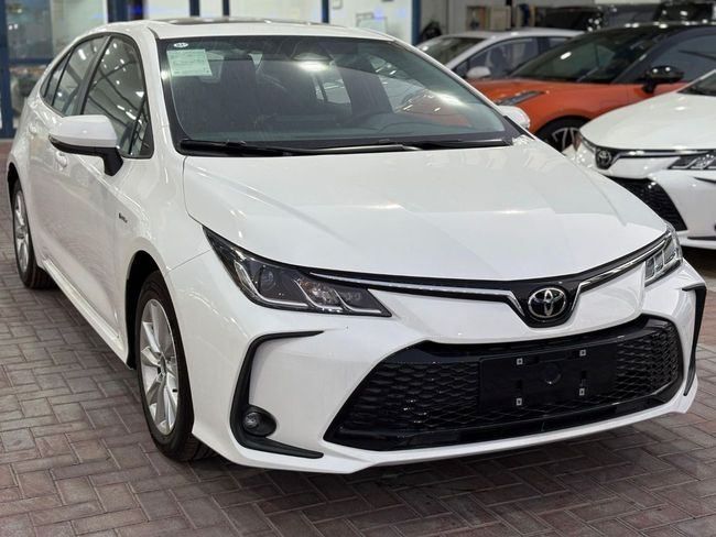 New Toyota Corolla XII (E210), 1.8 l, 2025 in Ajman by MAKKI MOTORS, White color. Chinese Specs | AUTO.AE