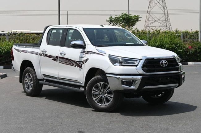 New Toyota Hilux VIII Facelift, 2.7 l, 2025 in Ajman by MAKKI MOTORS, White color. GCC Specs | AUTO.AE