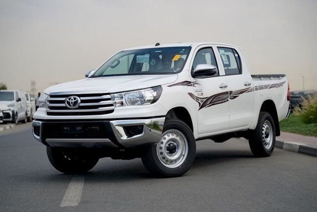 New Toyota Hilux VIII, 2.4 l, 2025 in Ajman by MAKKI MOTORS, White color. GCC Specs | AUTO.AE