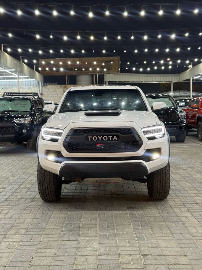 Подержанный ⁦Toyota Tacoma III, 3.5 л, 2023⁩ в ОАЭ, Аджман от SAFARI USED CARS Белый цвет. Американская | AUTO.AE | Объявление #285010