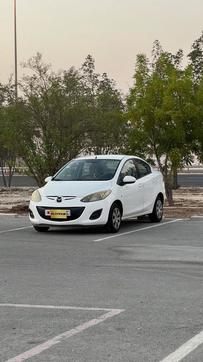 مستعملة ⁦Mazda 2 عملية فيس ليفت II (DE2)، 1.3 l، 2012⁩ في في البحرين, الرفاع من Platinum Company Car، اللون أبيض.  | AUTO.AE | إعلان #287579
