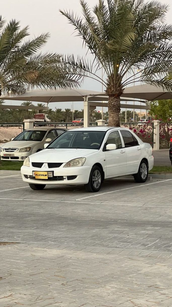 Подержанный ⁦Mitsubishi Lancer IX Рестайлинг, 2.0 л, 2010⁩ в Бахрейн, Ар Рифа‘ от Platinum Company Car Белый цвет.  | AUTO.AE | Объявление #287570