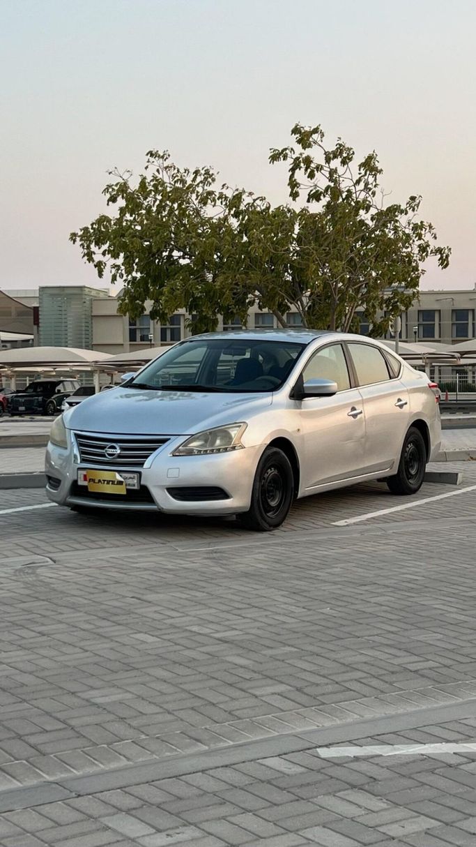 مستعملة ⁦Nissan Sentra سابعاً (B17)، 1.8 l، 2013⁩ في في البحرين, الرفاع من Platinum Company Car، اللون فضي.  | AUTO.AE | إعلان #287638
