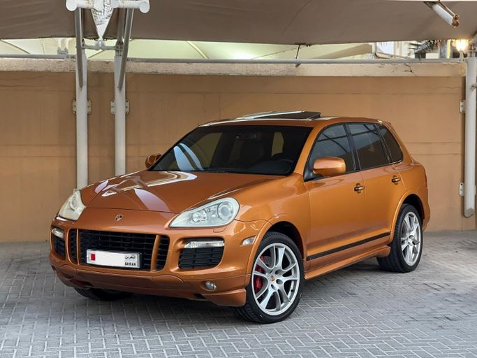 مستعملة ⁦Porsche Cayenne GTS أنا فيس ليفت (957)، 4.8 l، 2009⁩ في في البحرين, الرفاع من alhoot class showroom، اللون برتقالي.  | AUTO.AE | إعلان #290710