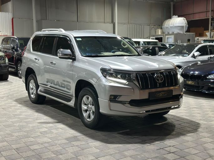 Подержанный ⁦Toyota Land Cruiser Prado 150 Series Рестайлинг 3, 2.7 л, 2020⁩ в Бахрейн, Ар Рифа‘ от Scoop Cars Серебристый цвет. GCC | AUTO.AE | Объявление #287853
