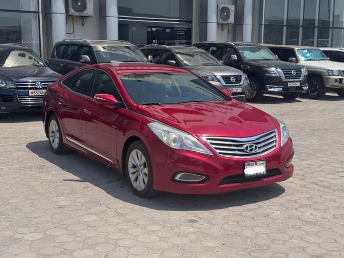 Used ⁦Hyundai Azera II, 3.0 l, 2012⁩ in Bahrain, Sitrah by Hamad89 Cars, Red color.  | AUTO.AE | Listing #291106