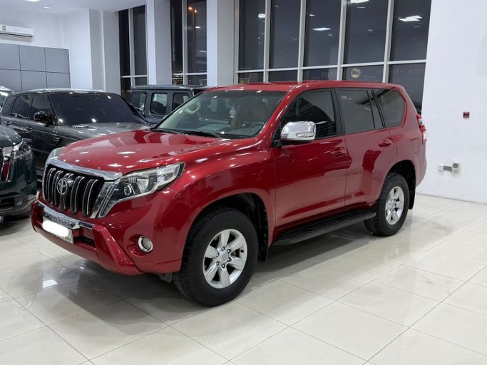 Used ⁦Toyota Land Cruiser Prado 150 Series Facelift 1, 2.7 l, 2016⁩ in Bahrain, Sitrah by Hamad89 Cars, Red color.  | AUTO.AE | Listing #291509