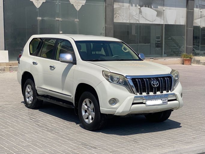 Used ⁦Toyota Land Cruiser Prado 150 Series Facelift 1, 2.7 l, 2014⁩ in Bahrain, Sitrah by Hamad89 Cars, White color.  | AUTO.AE | Listing #291511