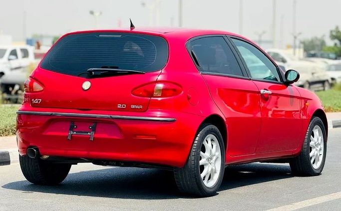 Подержанный Alfa Romeo 147 I, 2.0 л, 2003 в Дубае от Mirza Automobile FZE Красный цвет. Японская | AUTO.AE