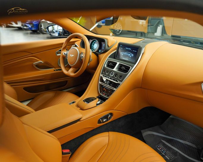 Новый Aston Martin DB11 I, 4.0 л, 2021 в Дубае от Pearl Motors Синий цвет. Европейская | AUTO.AE