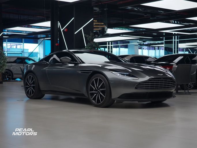Подержанный Aston Martin DB11 I, 4.0 л, 2020 в Дубае от Pearl Motors Черный цвет. Европейская | AUTO.AE
