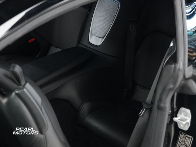 Подержанный Aston Martin DB11 I, 4.0 л, 2020 в Дубае от Pearl Motors Черный цвет. Европейская | AUTO.AE