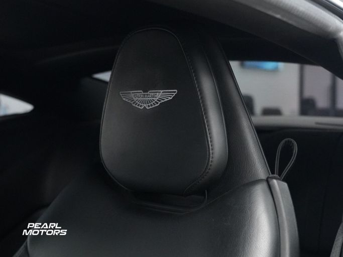 Подержанный Aston Martin DB11 I, 4.0 л, 2020 в Дубае от Pearl Motors Черный цвет. Европейская | AUTO.AE