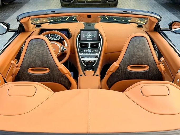 Used Aston Martin DB11 Volante I, 4.0 l, 2022 in Dubai by Auto Bank Motors, Navy Blue color. American Specs | AUTO.AE