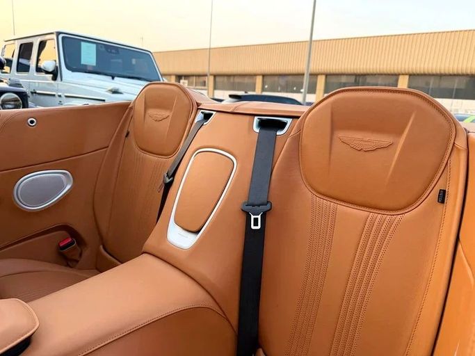 Used Aston Martin DB11 Volante I, 4.0 l, 2022 in Dubai by Auto Bank Motors, Navy Blue color. American Specs | AUTO.AE