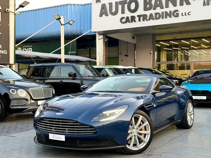 Used Aston Martin DB11 Volante I, 4.0 l, 2022 in Dubai by Auto Bank Motors, Navy Blue color. American Specs | AUTO.AE