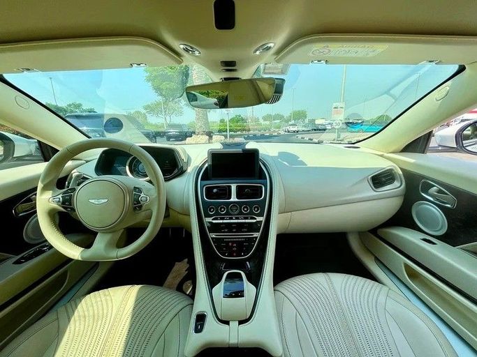 Used Aston Martin DB11 I, 5.2 l, 2017 in Dubai by 66 Motors, White color. GCC Specs | AUTO.AE