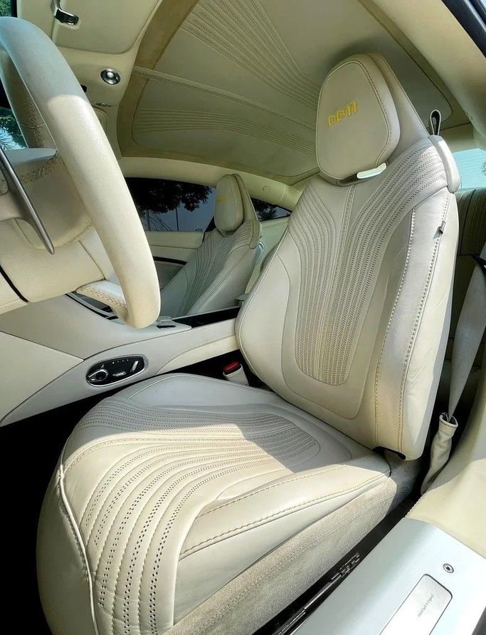 Used Aston Martin DB11 I, 5.2 l, 2017 in Dubai by 66 Motors, White color. GCC Specs | AUTO.AE