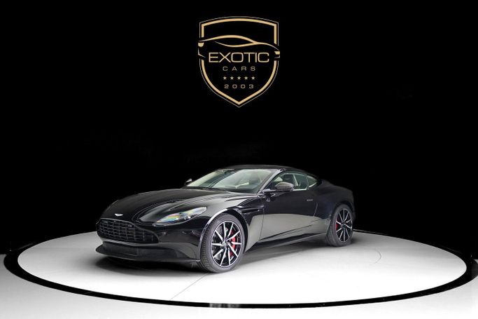 Used Aston Martin DB11 I, 5.2 l, 2018 in Dubai by Exotic Cars, Black color. Other | AUTO.AE