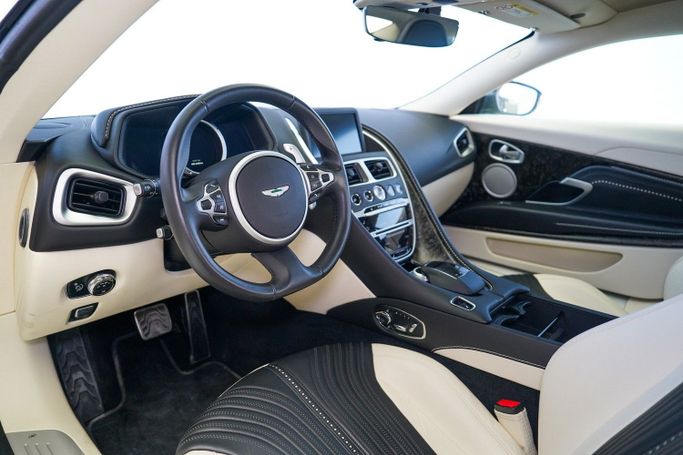 Used Aston Martin DB11 I, 5.2 l, 2018 in Dubai by Exotic Cars, Black color. Other | AUTO.AE