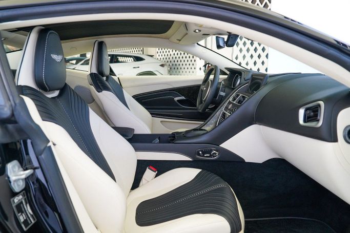 Used Aston Martin DB11 I, 5.2 l, 2018 in Dubai by Exotic Cars, Black color. Other | AUTO.AE