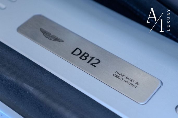 Подержанный Aston Martin DB12, 4.0 л, 2024 в Дубае от A1 Luxury Motors Белый цвет. GCC | AUTO.AE