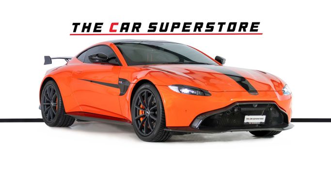 Подержанный Aston Martin V8 Vantage IV, 4.0 л, 2020 в Дубае от The Car Superstore Оранжевый цвет. GCC | AUTO.AE