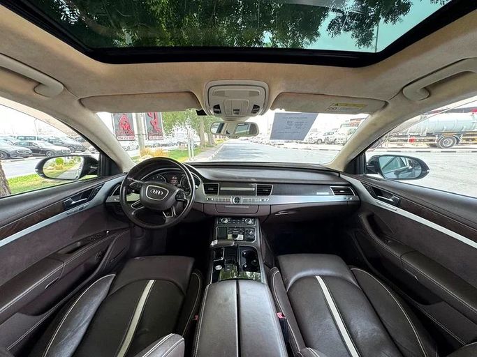 Подержанный Audi A8 III (D4), 4.2 л, 2012 в Дубае от Mirza Automobile FZE Черный цвет. Японская | AUTO.AE