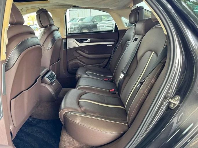 Подержанный Audi A8 III (D4), 4.2 л, 2012 в Дубае от Mirza Automobile FZE Черный цвет. Японская | AUTO.AE