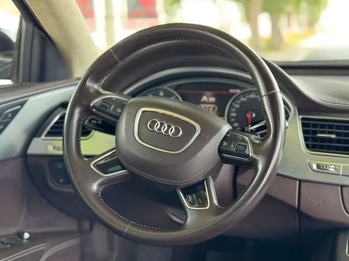 Подержанный Audi A8 III (D4), 4.2 л, 2012 в Дубае от Mirza Automobile FZE Черный цвет. Японская | AUTO.AE