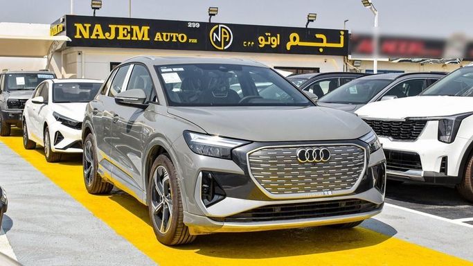 New Audi Q4 e-tron 40, 2024 in Dubai by Najem Motors, Grey color. Chinese Specs | AUTO.AE