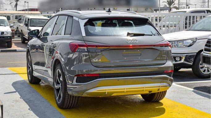 New Audi Q4 e-tron 40, 2024 in Dubai by Najem Motors, Grey color. Chinese Specs | AUTO.AE