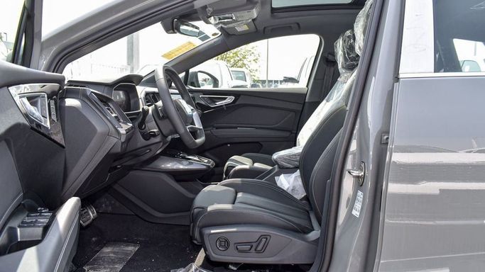 New Audi Q4 e-tron 40, 2024 in Dubai by Najem Motors, Grey color. Chinese Specs | AUTO.AE