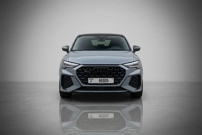 Audi RS Q3 II (F3), 2023  دفع رباعي 5 أبواب للتأجير في في دبي من Rotana Star Rent a Car، اللون رمادي | AUTO.AE