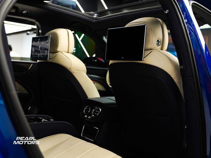 Подержанный Bentley Bentayga I Рестайлинг, 4.0 л, 2022 в Дубае от Pearl Motors Синий цвет. GCC | AUTO.AE