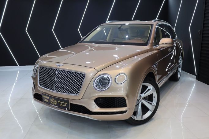 Used Bentley Bentayga I, 6.0 l, 2018 in Dubai by Sanam Cars, Golden color. GCC Specs | AUTO.AE